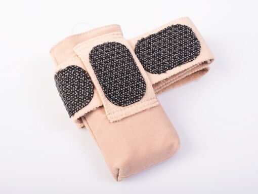 Close-up of gray gripper pads inside medtronic leg pouch belt
